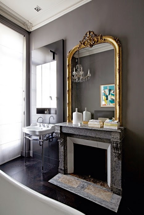 Dark walls in the bathroom, very chic in a Parisian appartment - via Habitually Chic