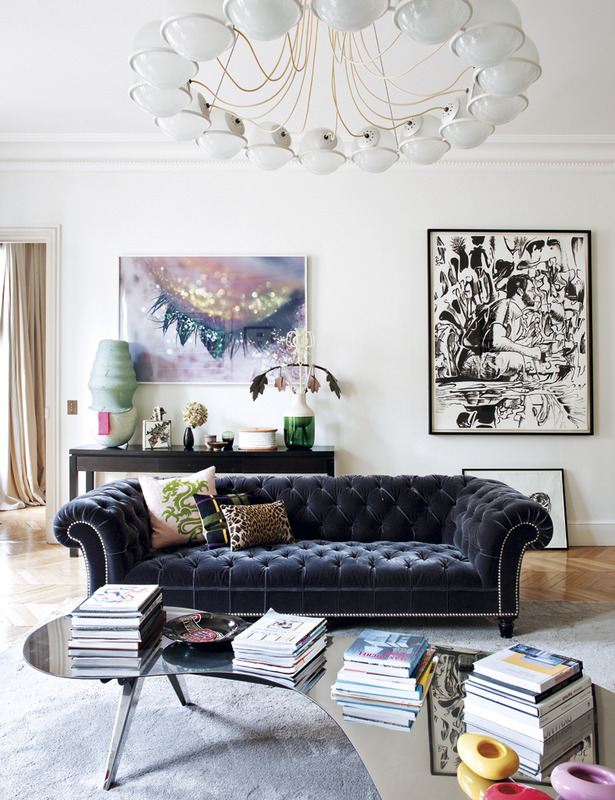 Deep blue velvet chesterfield in this eclectic apartment owned by French interior designer Sandra Benhamou's Paris apartment - via Sukio