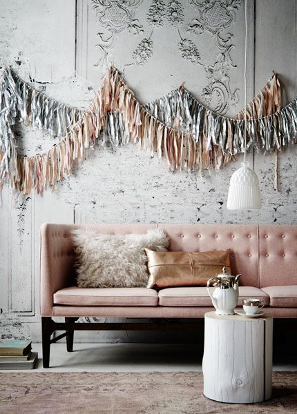 Love the copper-coloured leather pillow on the pink sofa, totally now - via Dutch VT Wonen