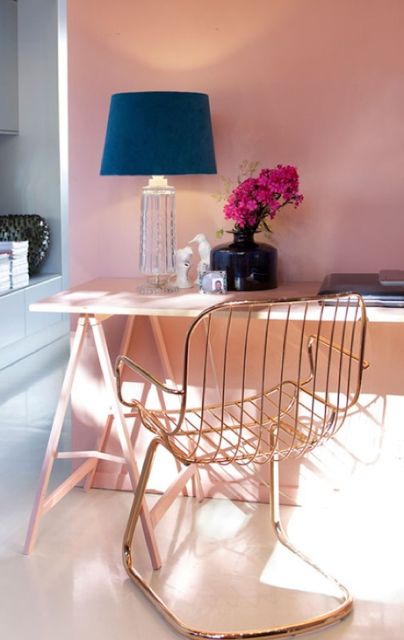 Pink desk and elegant copper tube chair - via Pink Wallpaper