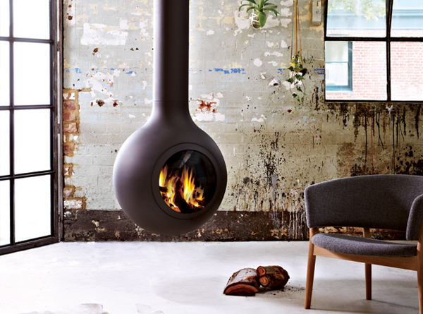 Suspended rounded woodstove, designed by Australian company Oblica