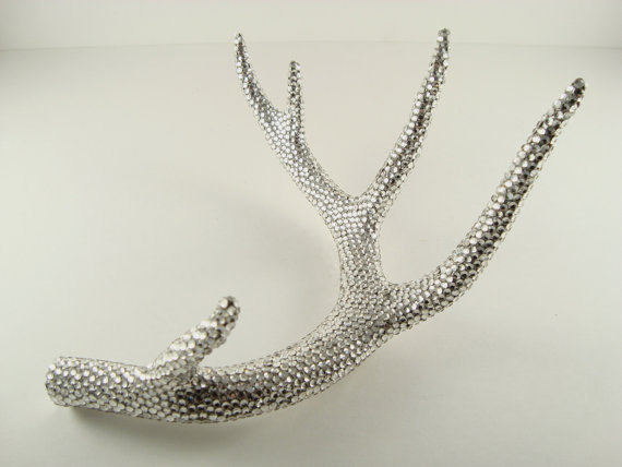 Antlers covered in Swarovski rhinestones, great if you like ott - via Etsy