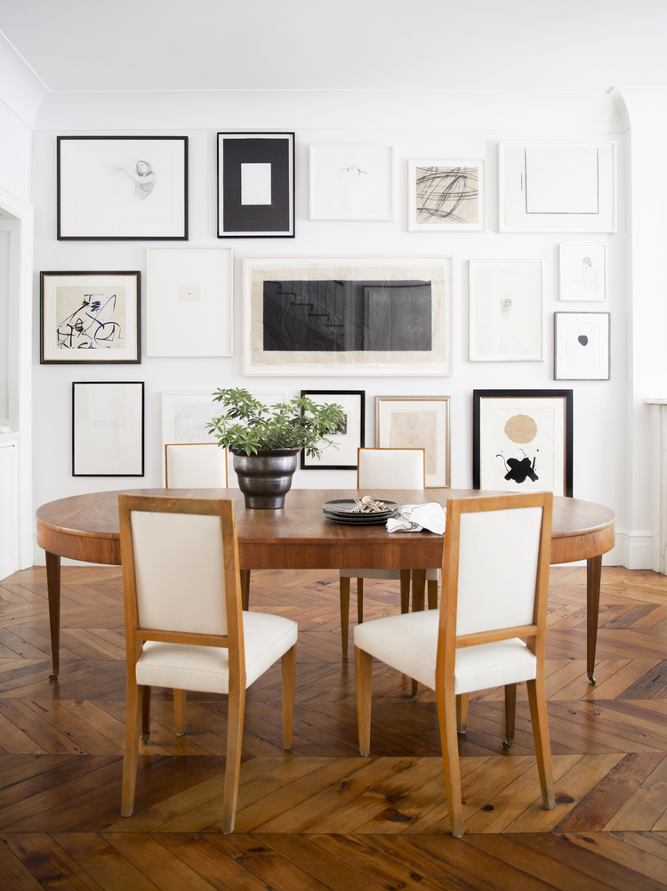 Floor to ceiling gallery wall in Ali Cayne's NY West Village townhouse - via Brittany Ambridge Photography