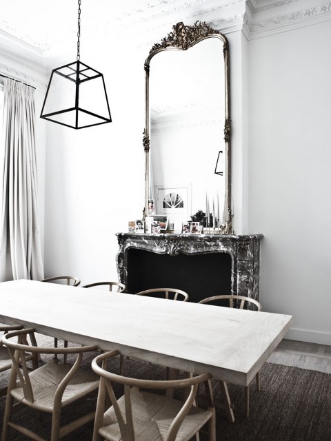 Wishbone Chairs and a minimal chandelier in this ornamented room - via Coco Lapine