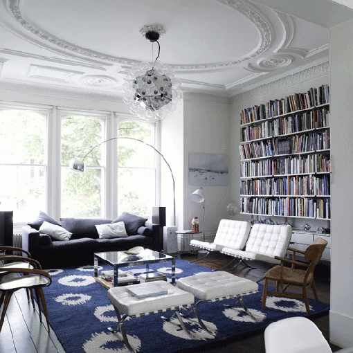 A very cool, classic city apartment, I spy some Design Classics such as the Barcelona Chairs, the Pretzel chairs as well as an Arco Lamp - via House to Home