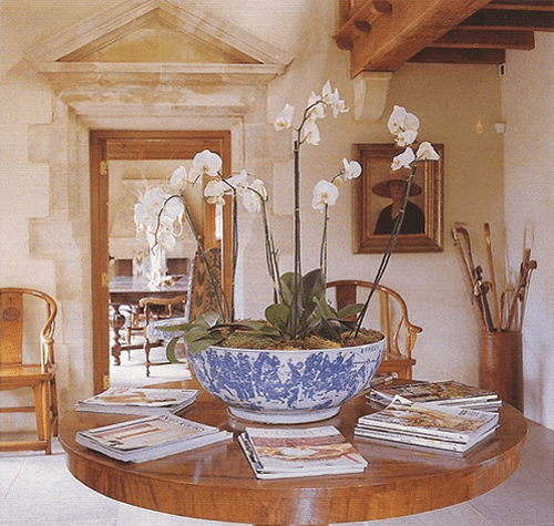 blue and white bowl with orchids