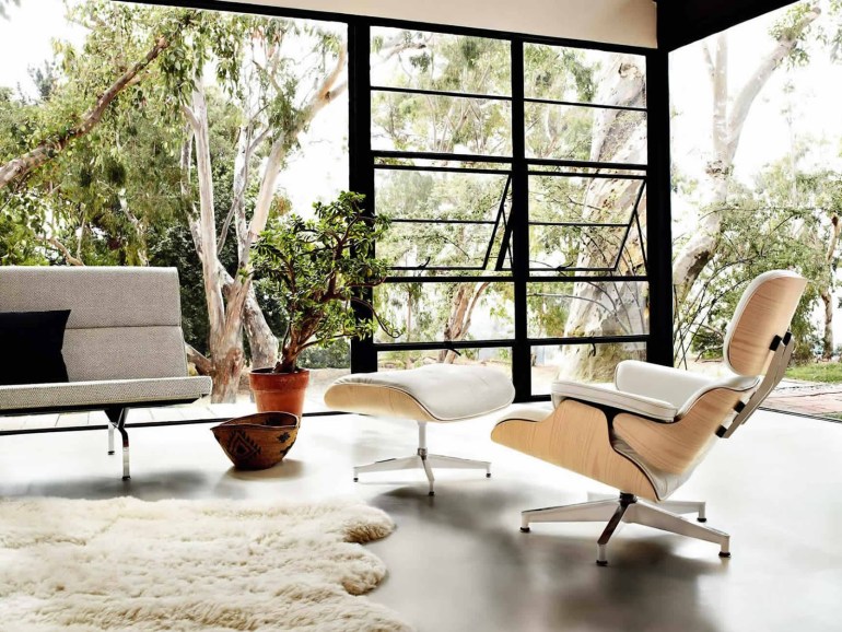 Eames lounge chair and ottoman, designed in 1956,  in white