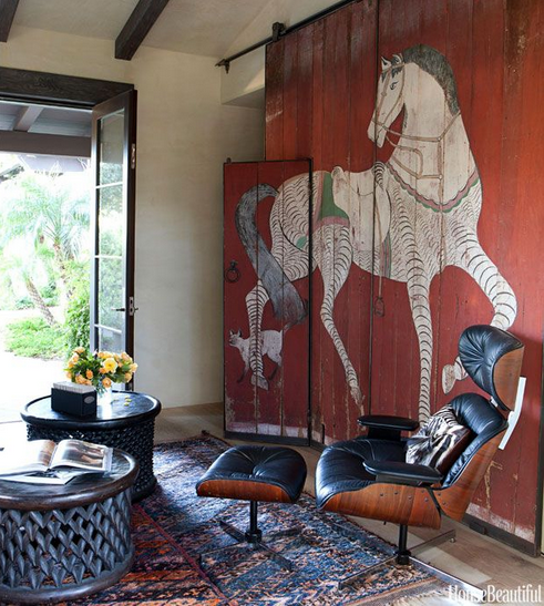 Eames lounge chair in black, 1956, via SmashCult.com