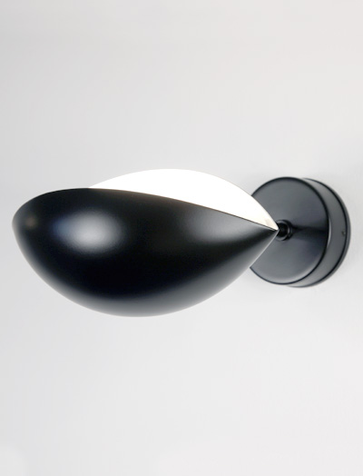 The Mouille "œil" or Eye Sconce is named for the shape of the shade. Designed by Mouille in 1953.