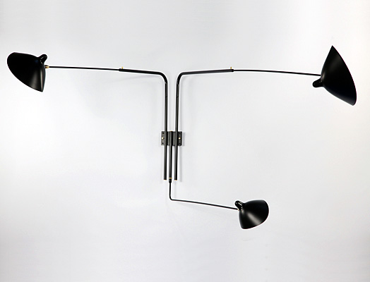 MSC-R3: this sconce can project light into a room at varying angles due to the independent rotation of each arm and each shade.