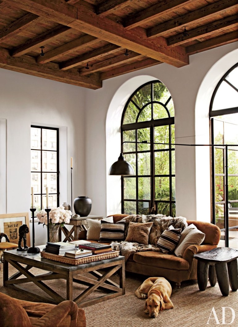 Steel windows incorporated in a rustic farmhouse, via Architectural Digest