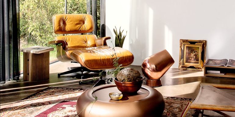 The famous Eames reclining chair - via Elle Decoration