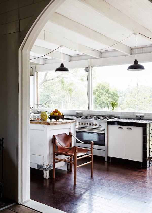 What a great chair in this old converted church kitchen in Australia - via Cococozy