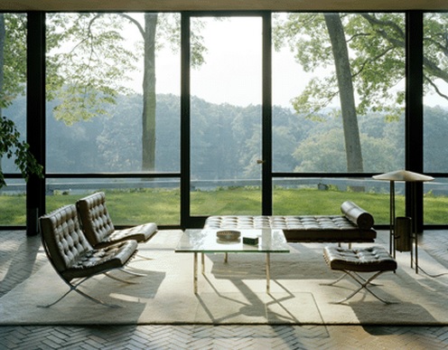 I love this whole, very Miesian setting, the furniture, the bare to the bones structure of the house and then that amazing view