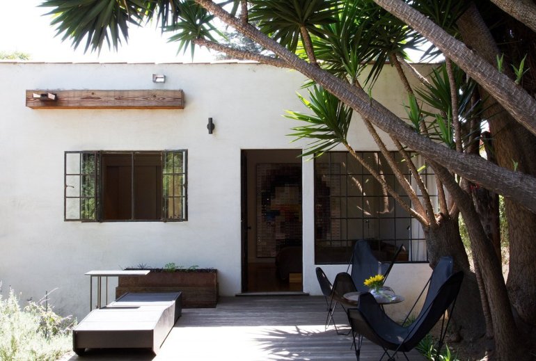 Black butterflies in the garden - via Apartement Therapy