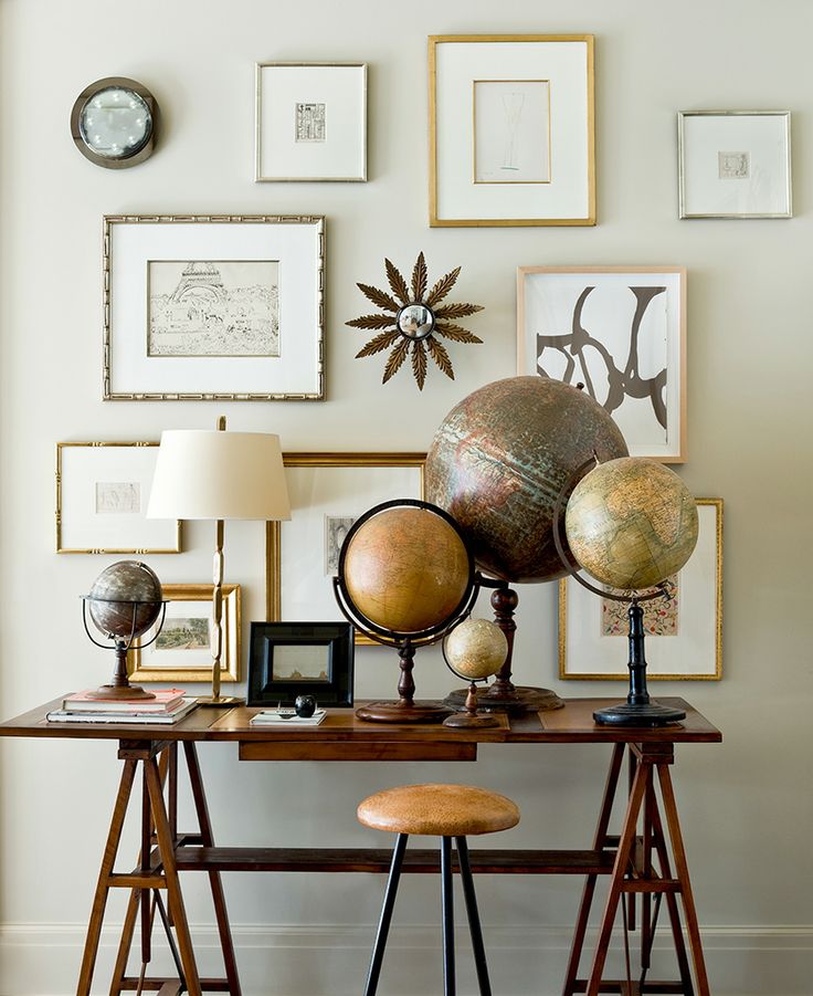 A collection of antique globes, thrown together by interior designer Suzanne Kasler - via Pinterest